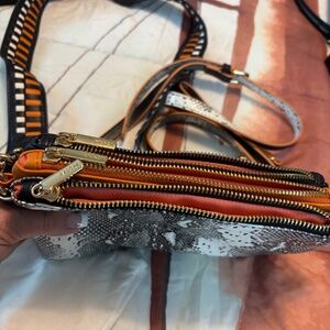 MERSI Vegan leather handbag with dust cover